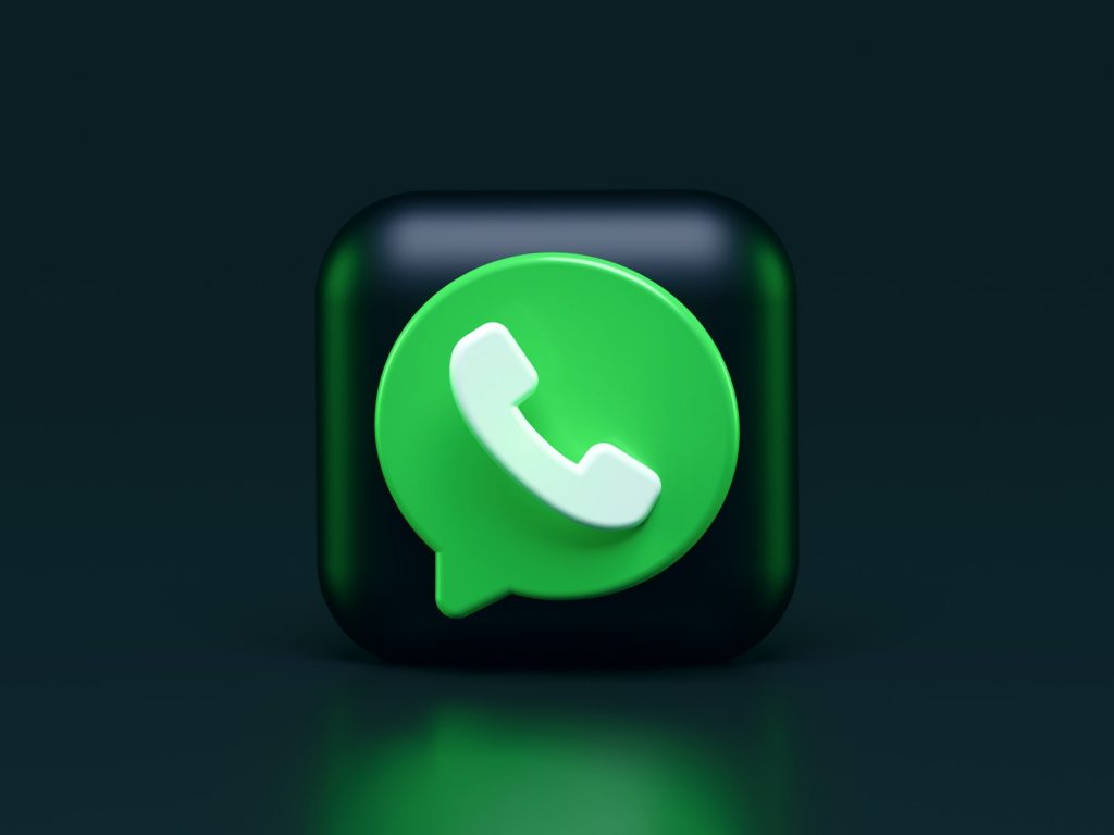 green and white whatsapp logo