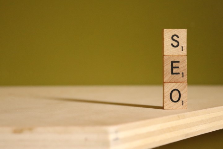 jenga tiles stacked spelling out seo
